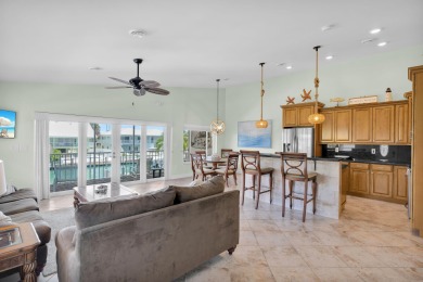 This well-maintained 2 Bedroom, 2 Bath elevated canal front half on Key Colony Beach Golf Course in Florida - for sale on GolfHomes.com, golf home, golf lot