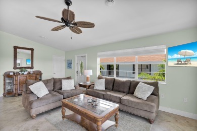 This well-maintained 2 Bedroom, 2 Bath elevated canal front half on Key Colony Beach Golf Course in Florida - for sale on GolfHomes.com, golf home, golf lot