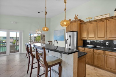 This well-maintained 2 Bedroom, 2 Bath elevated canal front half on Key Colony Beach Golf Course in Florida - for sale on GolfHomes.com, golf home, golf lot
