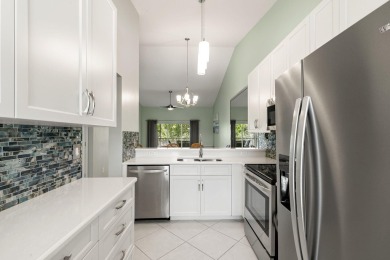 Wake up to the warmth of the southern sun streaming through your on Hammock Bay in Florida - for sale on GolfHomes.com, golf home, golf lot