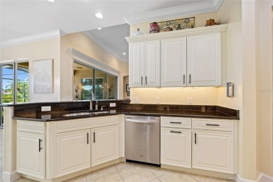 EXCEPTIONAL 2 BEDROOM + DEN, 2 BATH, 2-CAR GARAGE LAKEFRONT POOL on Riverwood Golf Club in Florida - for sale on GolfHomes.com, golf home, golf lot