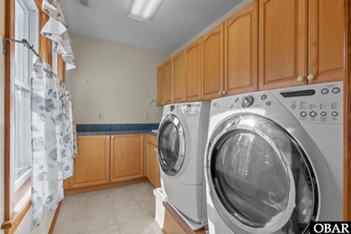 Set within the Kilmarlic Club, this thoughtfully designed on Kilmaric Golf Club in North Carolina - for sale on GolfHomes.com, golf home, golf lot