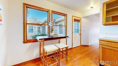 Wake up to peaceful water and fairway views in this beautiful on Cattail Creek Golf Course in Colorado - for sale on GolfHomes.com, golf home, golf lot