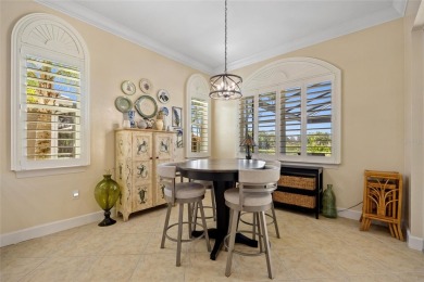 EXCEPTIONAL 2 BEDROOM + DEN, 2 BATH, 2-CAR GARAGE LAKEFRONT POOL on Riverwood Golf Club in Florida - for sale on GolfHomes.com, golf home, golf lot