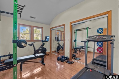 Set within the Kilmarlic Club, this thoughtfully designed on Kilmaric Golf Club in North Carolina - for sale on GolfHomes.com, golf home, golf lot