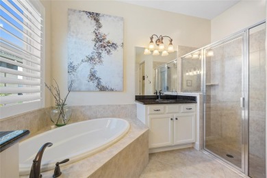 EXCEPTIONAL 2 BEDROOM + DEN, 2 BATH, 2-CAR GARAGE LAKEFRONT POOL on Riverwood Golf Club in Florida - for sale on GolfHomes.com, golf home, golf lot
