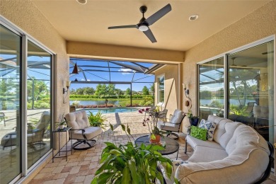 EXCEPTIONAL 2 BEDROOM + DEN, 2 BATH, 2-CAR GARAGE LAKEFRONT POOL on Riverwood Golf Club in Florida - for sale on GolfHomes.com, golf home, golf lot