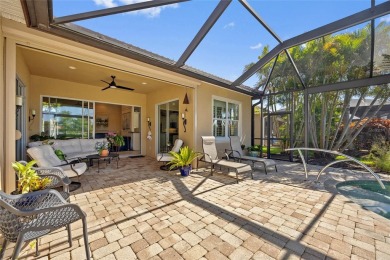 EXCEPTIONAL 2 BEDROOM + DEN, 2 BATH, 2-CAR GARAGE LAKEFRONT POOL on Riverwood Golf Club in Florida - for sale on GolfHomes.com, golf home, golf lot