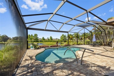 EXCEPTIONAL 2 BEDROOM + DEN, 2 BATH, 2-CAR GARAGE LAKEFRONT POOL on Riverwood Golf Club in Florida - for sale on GolfHomes.com, golf home, golf lot