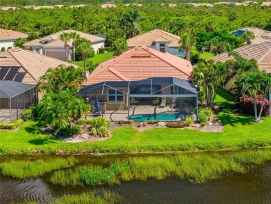 EXCEPTIONAL 2 BEDROOM + DEN, 2 BATH, 2-CAR GARAGE LAKEFRONT POOL on Riverwood Golf Club in Florida - for sale on GolfHomes.com, golf home, golf lot