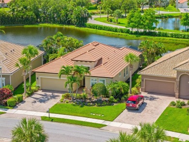 EXCEPTIONAL 2 BEDROOM + DEN, 2 BATH, 2-CAR GARAGE LAKEFRONT POOL on Riverwood Golf Club in Florida - for sale on GolfHomes.com, golf home, golf lot