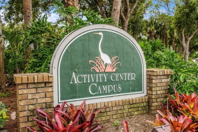 EXCEPTIONAL 2 BEDROOM + DEN, 2 BATH, 2-CAR GARAGE LAKEFRONT POOL on Riverwood Golf Club in Florida - for sale on GolfHomes.com, golf home, golf lot