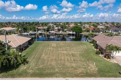 VACANT, WATERFRONT LOT IN BURNT STORE ISLES - This oversized on Twin Isles Country Club in Florida - for sale on GolfHomes.com, golf home, golf lot