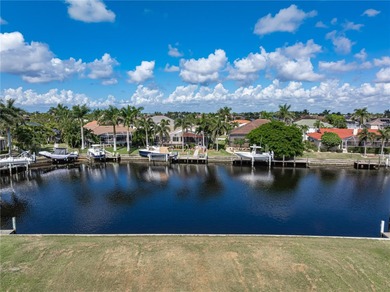 VACANT, WATERFRONT LOT IN BURNT STORE ISLES - This oversized on Twin Isles Country Club in Florida - for sale on GolfHomes.com, golf home, golf lot