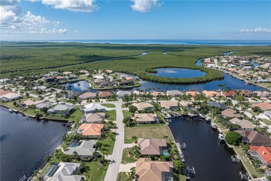 VACANT, WATERFRONT LOT IN BURNT STORE ISLES - This oversized on Twin Isles Country Club in Florida - for sale on GolfHomes.com, golf home, golf lot