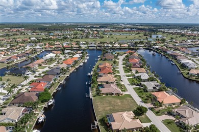 VACANT, WATERFRONT LOT IN BURNT STORE ISLES - This oversized on Twin Isles Country Club in Florida - for sale on GolfHomes.com, golf home, golf lot