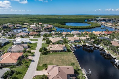 VACANT, WATERFRONT LOT IN BURNT STORE ISLES - This oversized on Twin Isles Country Club in Florida - for sale on GolfHomes.com, golf home, golf lot