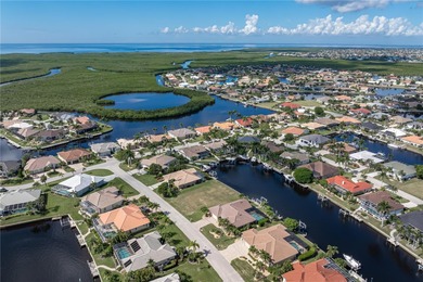 VACANT, WATERFRONT LOT IN BURNT STORE ISLES - This oversized on Twin Isles Country Club in Florida - for sale on GolfHomes.com, golf home, golf lot