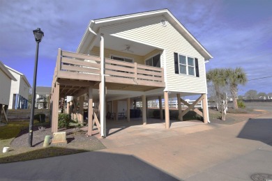Your Slice of Paradise Awaits at 9620 Windchime Dr.!  Imagine on The Dunes Golf and Beach Club in South Carolina - for sale on GolfHomes.com, golf home, golf lot
