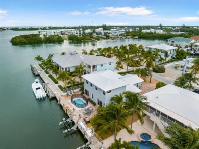 This Key Colony Beach coastal retreat blends modern elegance on Key Colony Beach Golf Course in Florida - for sale on GolfHomes.com, golf home, golf lot