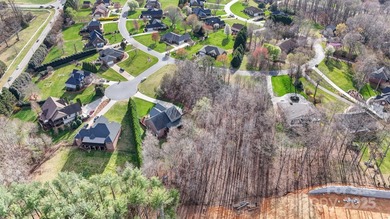 Exclusive 1.01 Acre Lot in Prestigious Rock Barn Country Club & on Rock Barn Golf and Spa in North Carolina - for sale on GolfHomes.com, golf home, golf lot