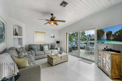 This Key Colony Beach coastal retreat blends modern elegance on Key Colony Beach Golf Course in Florida - for sale on GolfHomes.com, golf home, golf lot