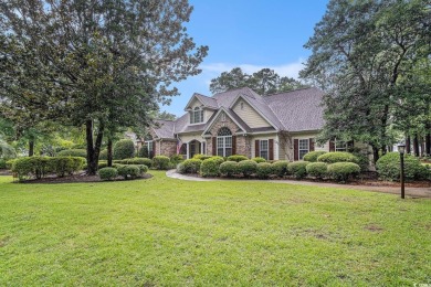 Elegance meets timeless Southern charm in this exquisite on Pawleys Plantation Golf and Country Club in South Carolina - for sale on GolfHomes.com, golf home, golf lot