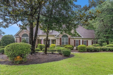 Elegance meets timeless Southern charm in this exquisite on Pawleys Plantation Golf and Country Club in South Carolina - for sale on GolfHomes.com, golf home, golf lot