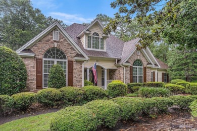 Elegance meets timeless Southern charm in this exquisite on Pawleys Plantation Golf and Country Club in South Carolina - for sale on GolfHomes.com, golf home, golf lot