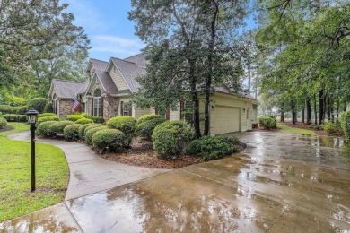 Elegance meets timeless Southern charm in this exquisite on Pawleys Plantation Golf and Country Club in South Carolina - for sale on GolfHomes.com, golf home, golf lot