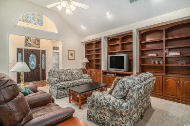 Elegance meets timeless Southern charm in this exquisite on Pawleys Plantation Golf and Country Club in South Carolina - for sale on GolfHomes.com, golf home, golf lot