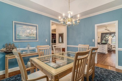 Elegance meets timeless Southern charm in this exquisite on Pawleys Plantation Golf and Country Club in South Carolina - for sale on GolfHomes.com, golf home, golf lot