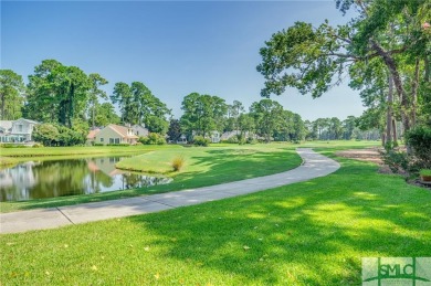 This hard-coat stucco home is positioned on a beautiful lot with on The Landings Club - Oakridge in Georgia - for sale on GolfHomes.com, golf home, golf lot