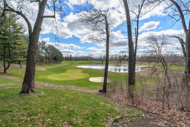 This fantastic home overlooks the 14th green of Lake Cora Hills on Lake Cora Hills Golf Club in Michigan - for sale on GolfHomes.com, golf home, golf lot