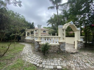 Excellent property offering endless of possibilities situated on Banyan Golf Club in Florida - for sale on GolfHomes.com, golf home, golf lot