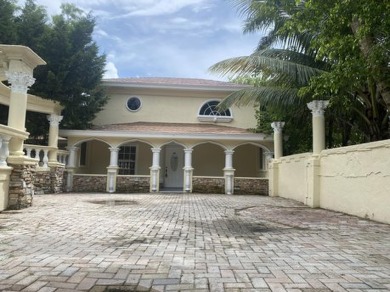 Excellent property offering endless of possibilities situated on Banyan Golf Club in Florida - for sale on GolfHomes.com, golf home, golf lot