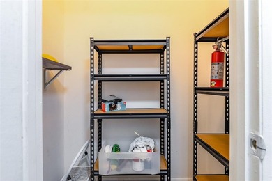 Beautifully remodeled first-floor unit filled with natural light on Hillsboro Pines Golf in Florida - for sale on GolfHomes.com, golf home, golf lot