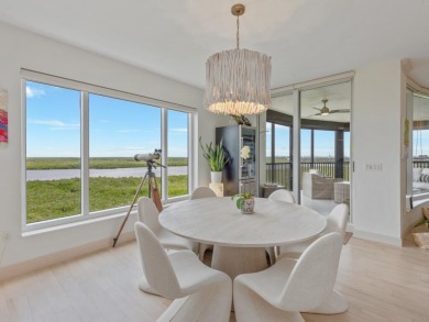 Experience refined coastal living in this elegant residence at on Hammock Bay in Florida - for sale on GolfHomes.com, golf home, golf lot