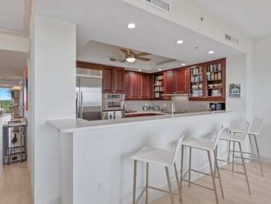 Experience refined coastal living in this elegant residence at on Hammock Bay in Florida - for sale on GolfHomes.com, golf home, golf lot
