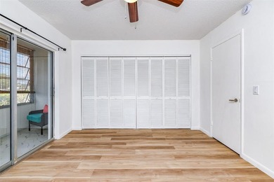 Beautifully remodeled first-floor unit filled with natural light on Hillsboro Pines Golf in Florida - for sale on GolfHomes.com, golf home, golf lot