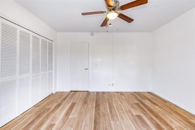 Beautifully remodeled first-floor unit filled with natural light on Hillsboro Pines Golf in Florida - for sale on GolfHomes.com, golf home, golf lot