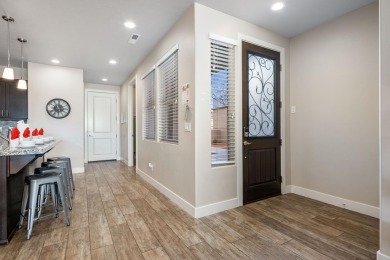 This stunning home is located in the highly sought-after on Entrada at Snow Canyon in Utah - for sale on GolfHomes.com, golf home, golf lot