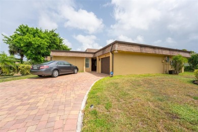 Welcome to your dream home! This stunning 3-bedroom, 2-bath on Woodlands Country Club in Florida - for sale on GolfHomes.com, golf home, golf lot