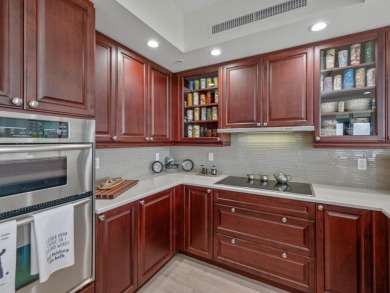 Experience refined coastal living in this elegant residence at on Hammock Bay in Florida - for sale on GolfHomes.com, golf home, golf lot