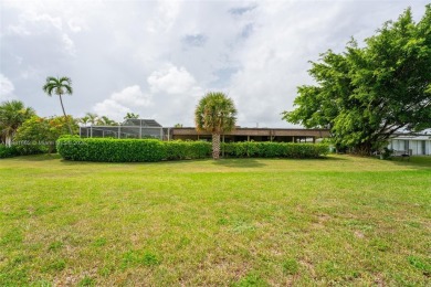 Welcome to your dream home! This stunning 3-bedroom, 2-bath on Woodlands Country Club in Florida - for sale on GolfHomes.com, golf home, golf lot