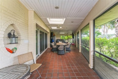Welcome to your dream home! This stunning 3-bedroom, 2-bath on Woodlands Country Club in Florida - for sale on GolfHomes.com, golf home, golf lot