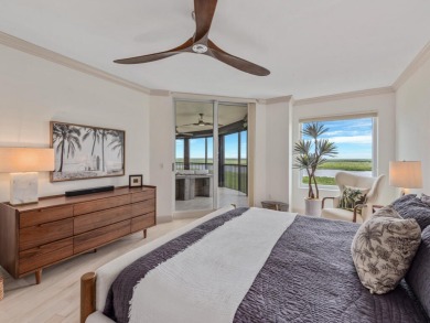 Experience refined coastal living in this elegant residence at on Hammock Bay in Florida - for sale on GolfHomes.com, golf home, golf lot