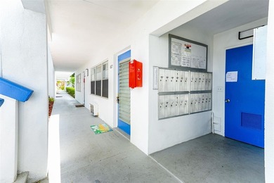 Beautifully remodeled first-floor unit filled with natural light on Hillsboro Pines Golf in Florida - for sale on GolfHomes.com, golf home, golf lot