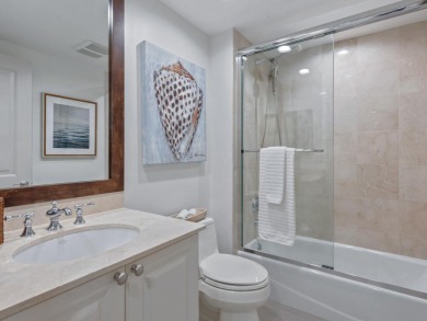 Experience refined coastal living in this elegant residence at on Hammock Bay in Florida - for sale on GolfHomes.com, golf home, golf lot