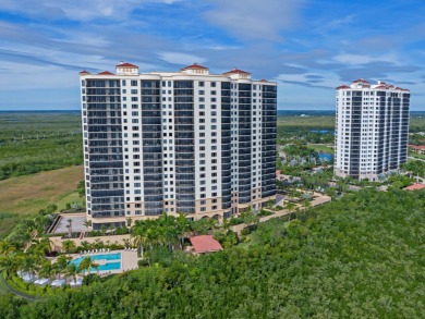 Experience refined coastal living in this elegant residence at on Hammock Bay in Florida - for sale on GolfHomes.com, golf home, golf lot